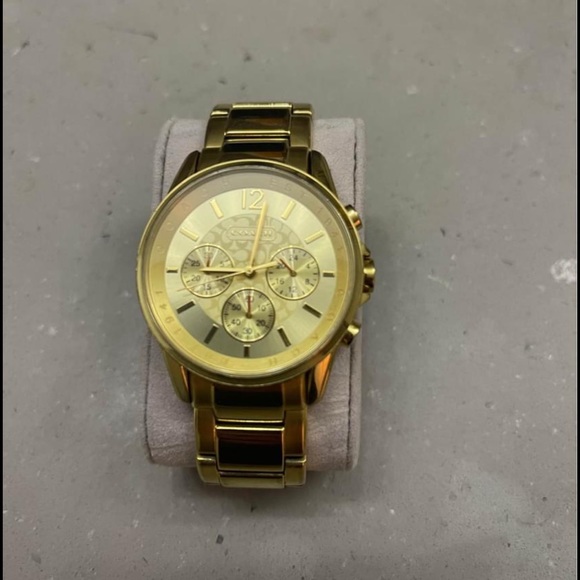 Gold coach watch